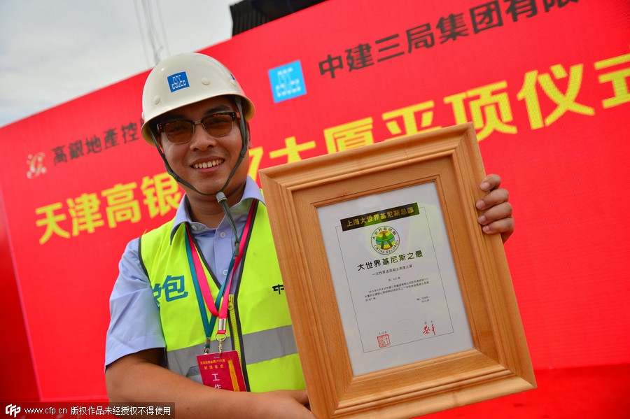 World's second tallest building capped in Tianjin