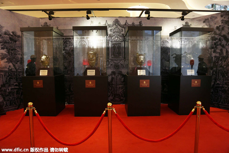 Animal heads of Old Summer Palace relics on display in Shanghai