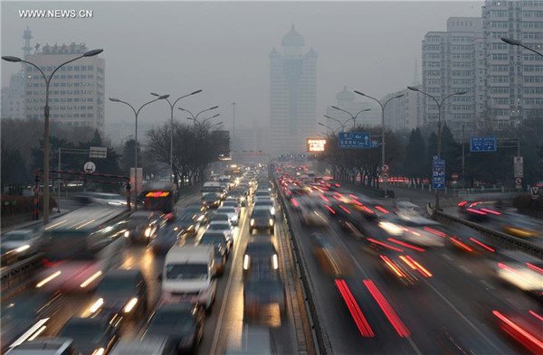 Beijing issues blue alert for heavy air pollution