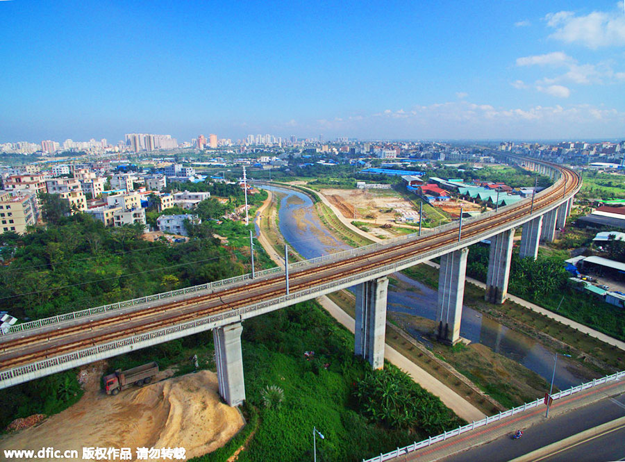 World's first high-speed train line circling an island opens in Hainan