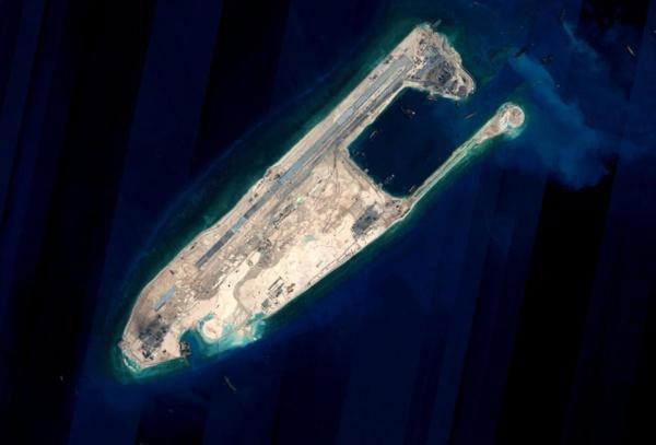 China conducts successful test flights at newly-built airfield in South China Sea