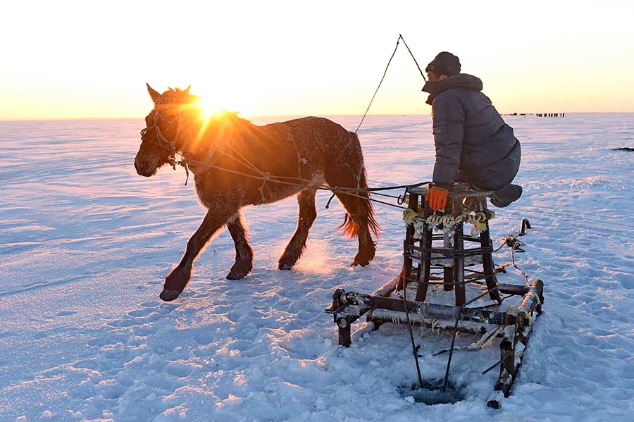 Traditional ice fishing techniques on display in Jilin province