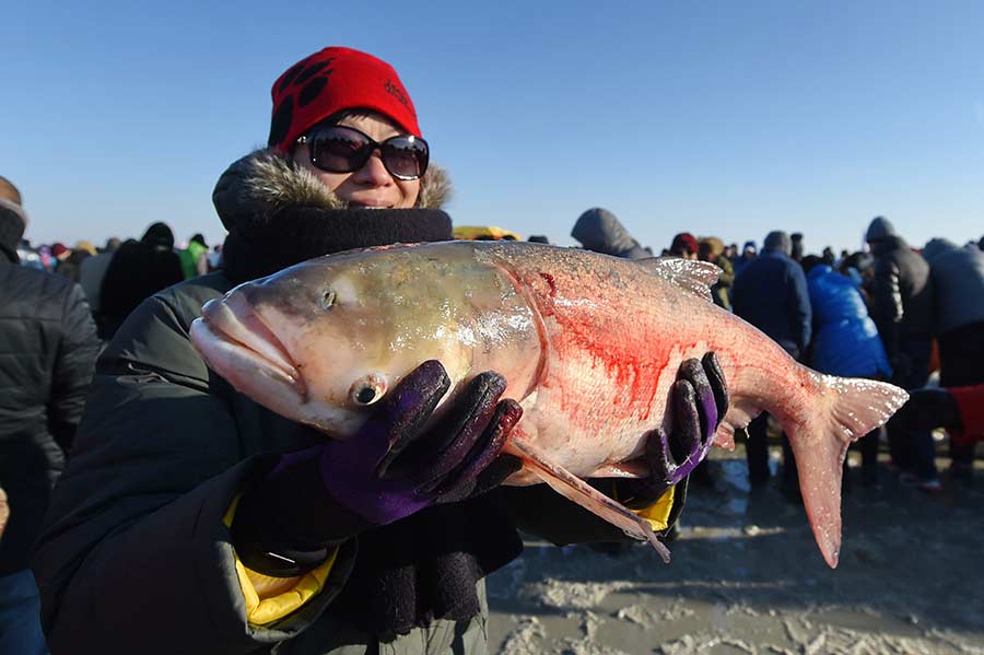 Traditional ice fishing techniques on display in Jilin province