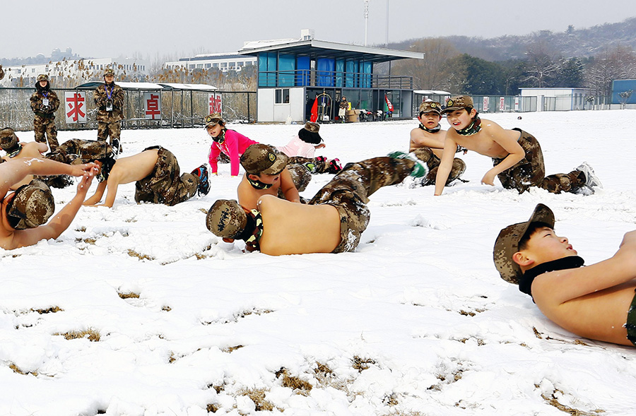 Topless children in wintry cold raises online furor