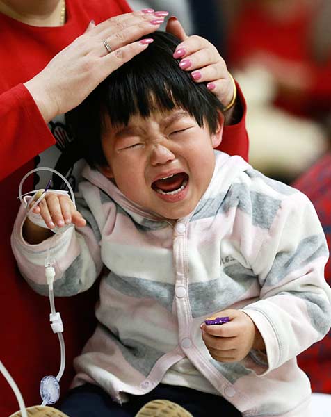 Thousands of kids fall ill with flu in Beijing