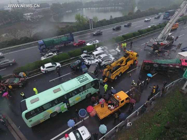 Two people died, dozens injured in east China's highway pileup