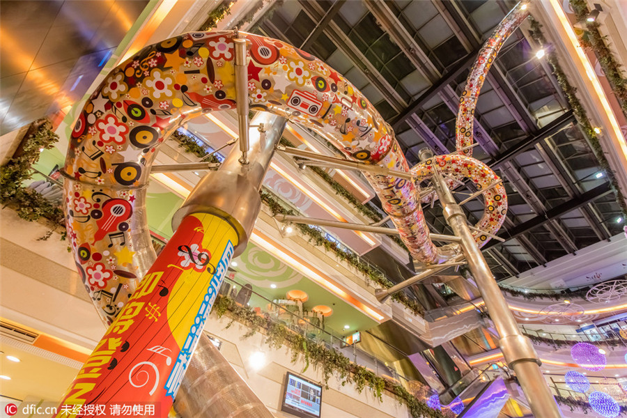 Spiral tube slide opens in Shanghai shopping mall