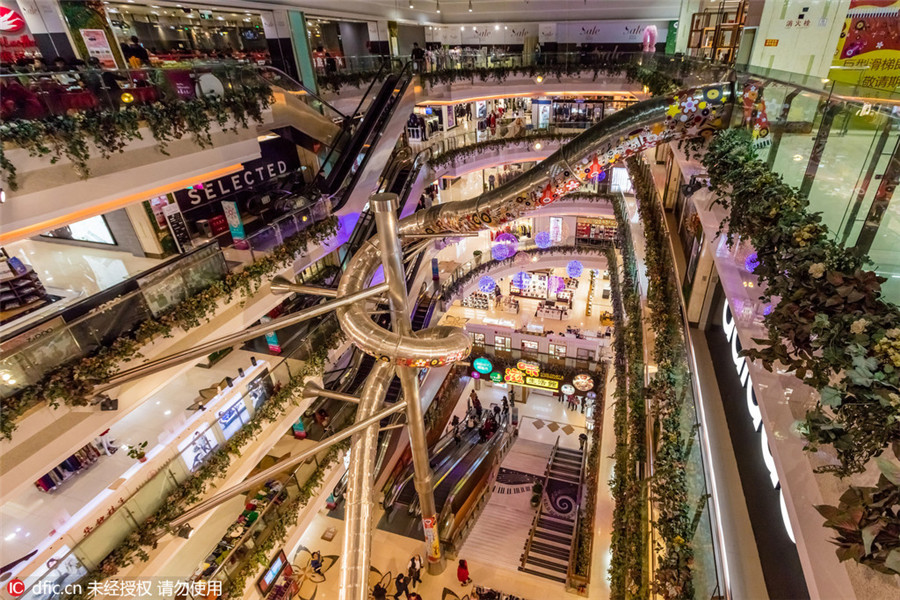 Spiral tube slide opens in Shanghai shopping mall