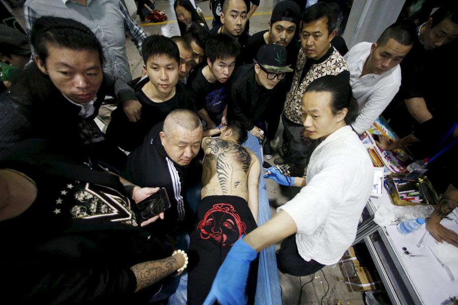 Tattoo fans, artists gather at Shanghai international art festival