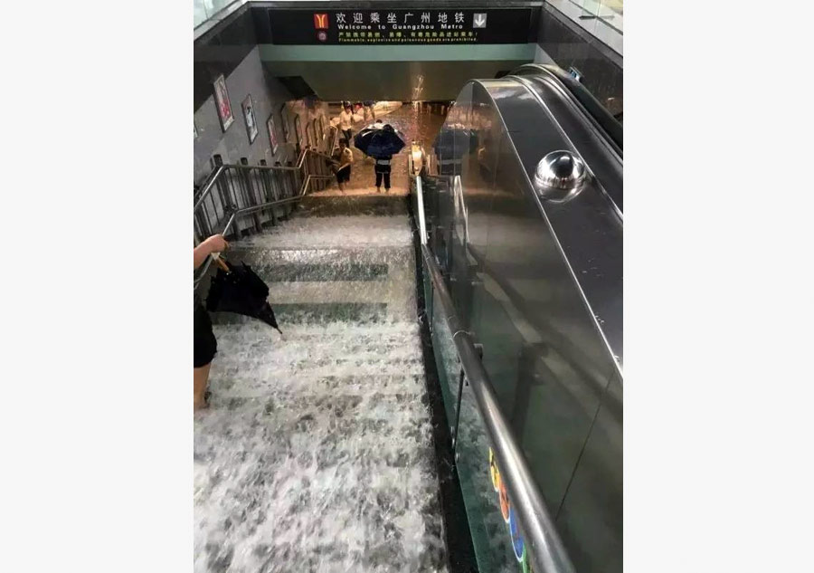 Heavy rains flood streets in Guangzhou