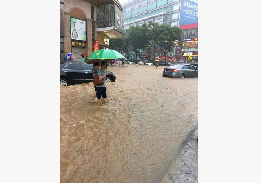 Heavy rains flood streets in Guangzhou