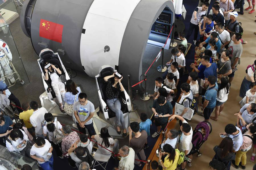 People visit China's sci-tech innovation exhibition in Beijing