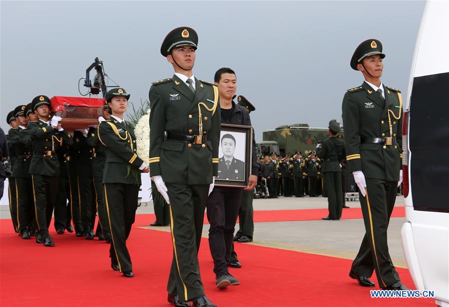 Peacekeeper's body returns for burial