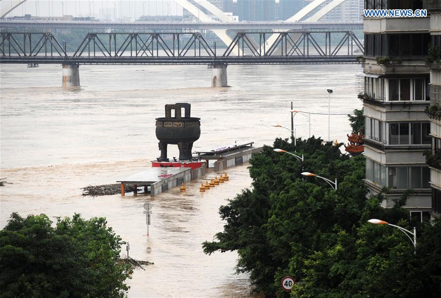 13 dead, 13 missing in China rain, landslides