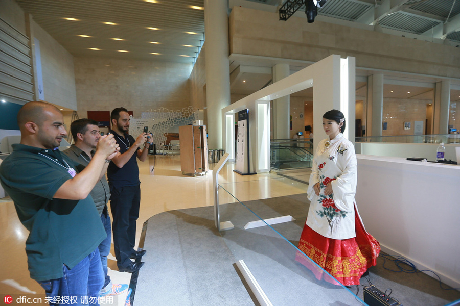 Beauty robot attracts attention during Summer Davos in Tianjin