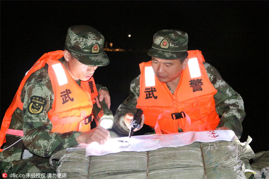 Remember emerging heroes in China's floods