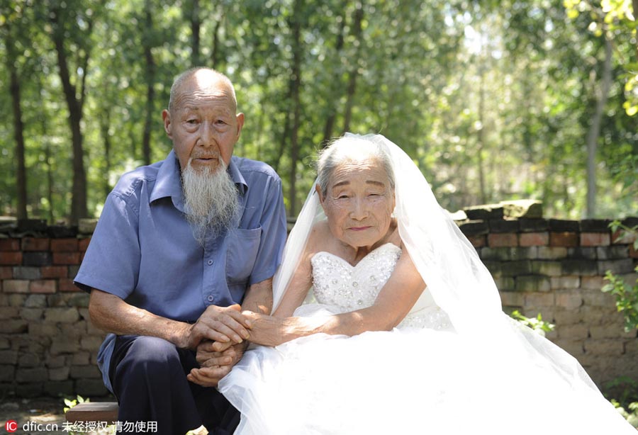 Centenarian couple embrace diamond wedding anniversary