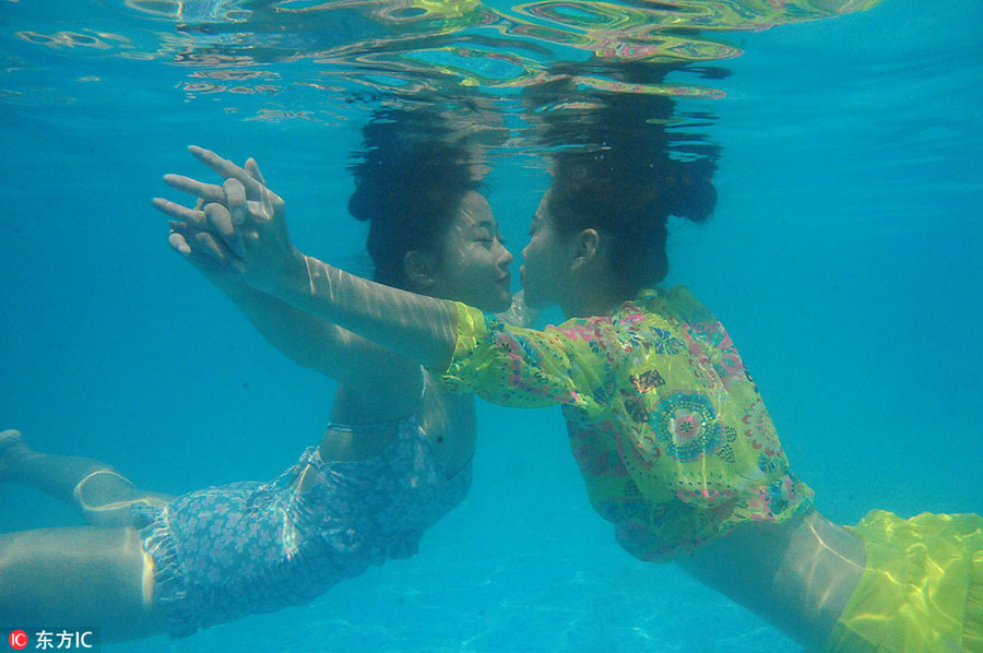 Underwater show cheers for Olympians