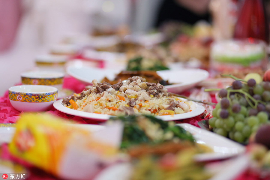 Dancing, food and religion, all in a Xinjiang wedding