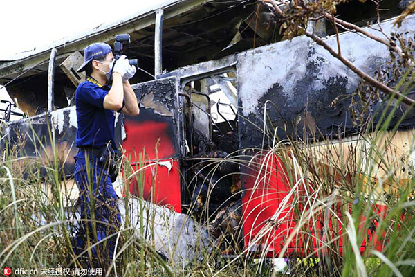 26 die after tour bus catches fire on highway in Taiwan