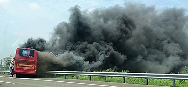 26 die after tour bus catches fire on highway in Taiwan