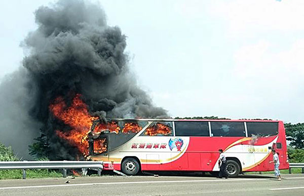 26 die after tour bus catches fire on highway in Taiwan