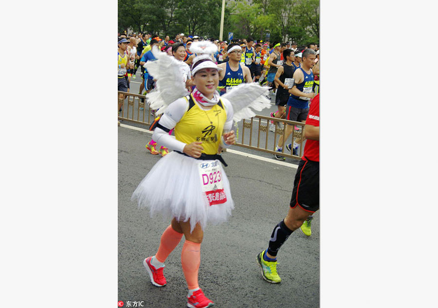 Runners compete during Beijing marathon