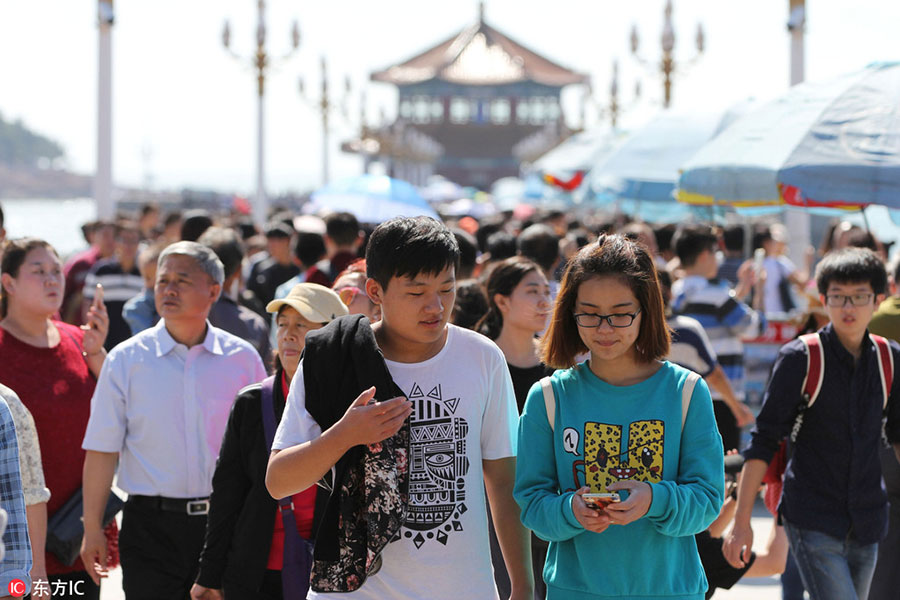 Millions move across China on National Day