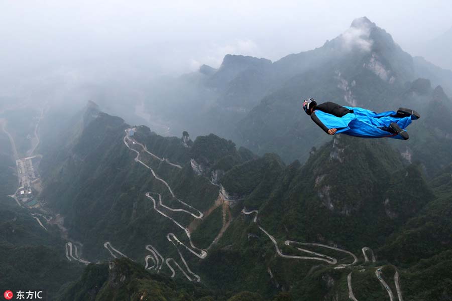 Flying over the mountains in wingsuit