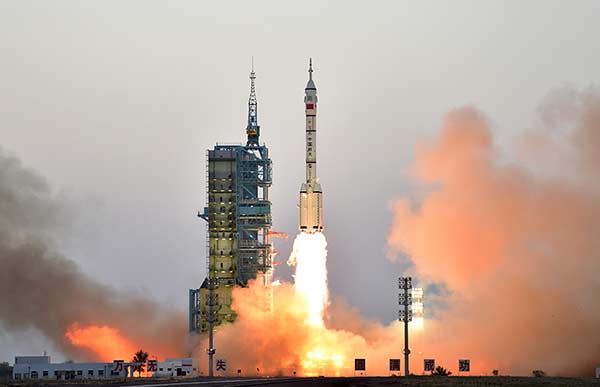 China launches manned spacecraft