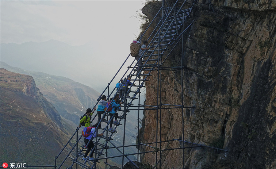 Steel ladder opens safer path for cliff village children