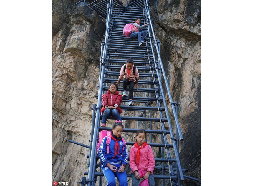 Steel ladder opens safer path for cliff village children