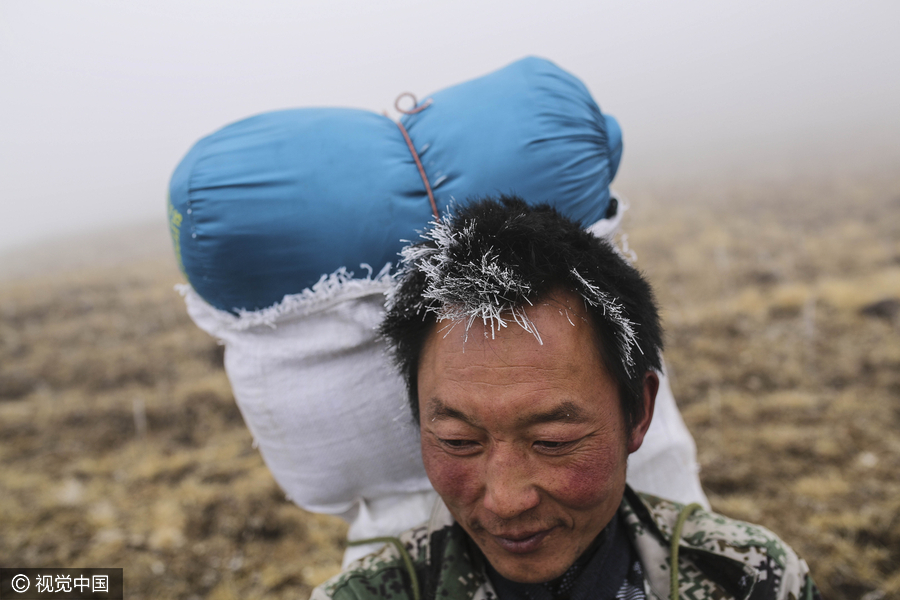 The hard and worthwhile life of anti-poaching patrol team in SW China