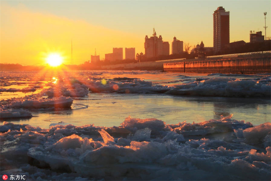 Ice sparkles under dazzling colors in Heilongjiang