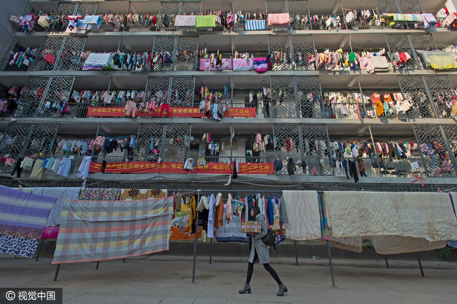 Students dry quilts and clothes in winter sunshine