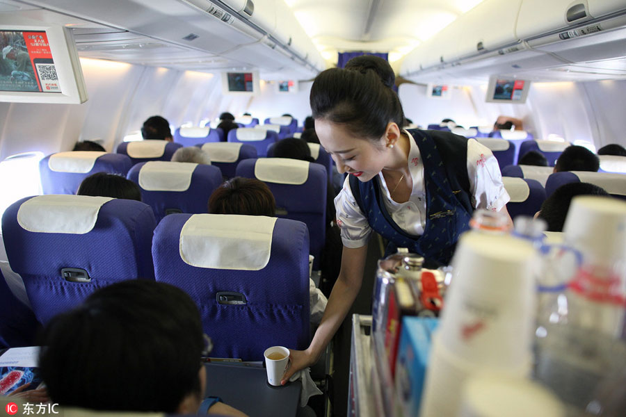 World's most beautiful stewardess: Serving passengers with smile