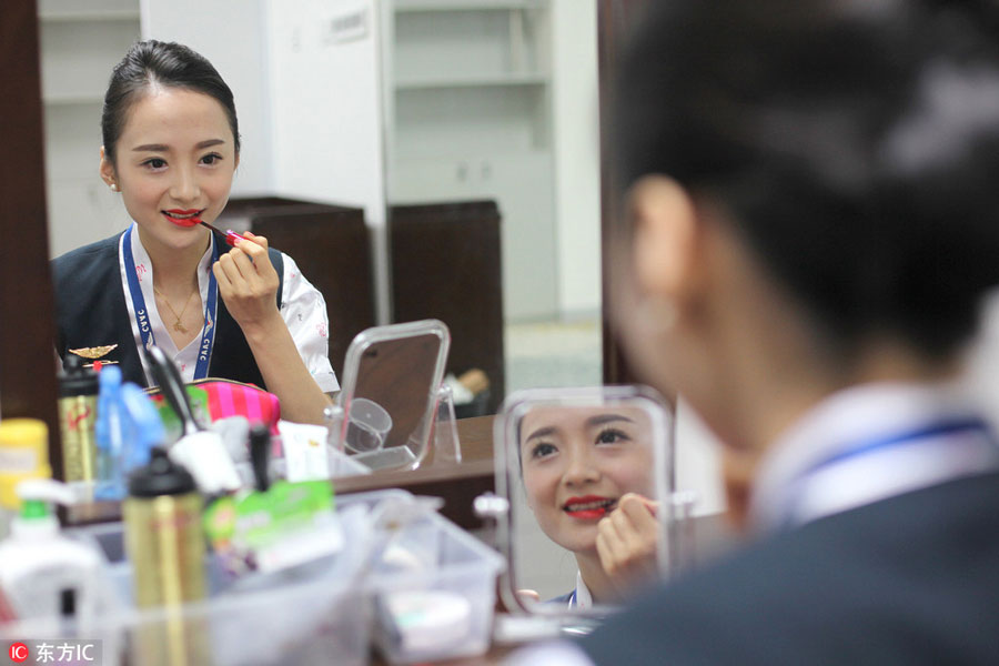 World's most beautiful stewardess: Serving passengers with smile