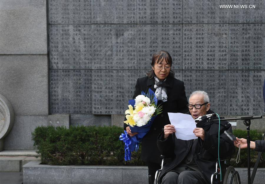 People mourn family members ahead of National Memorial Day for Nanjing Massacre Victims
