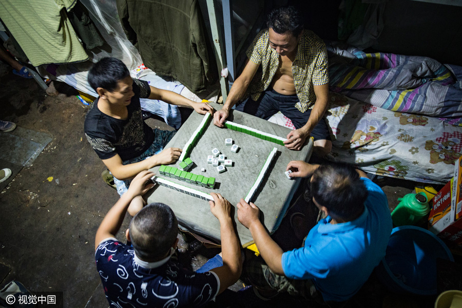 Workers behind Beijing's tallest building