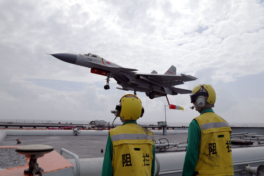 China's aircraft carrier returns to port after drill
