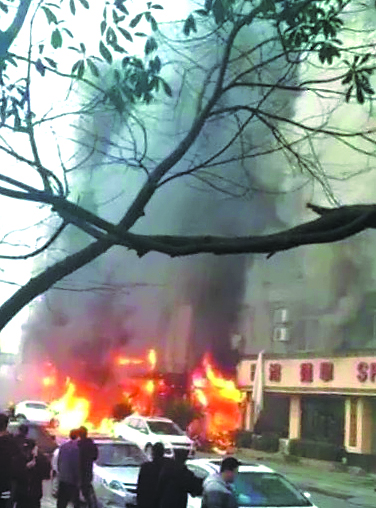 18 killed, 2 injured in massage parlor fire