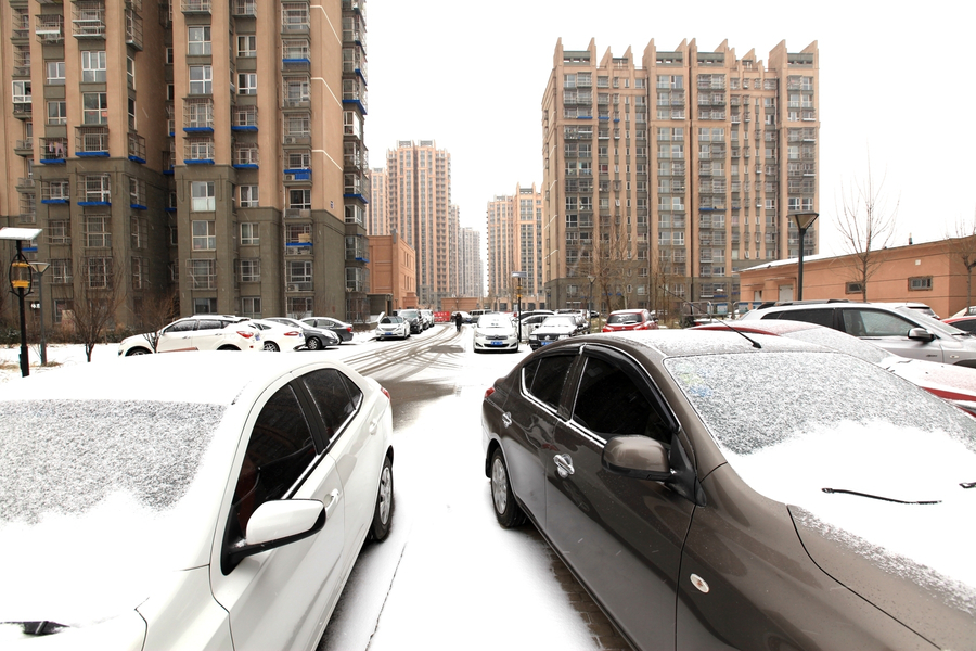 Beijing welcomes first snow in Year of the Rooster