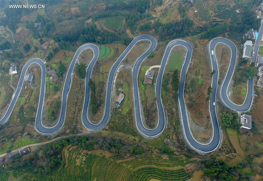 Winding road looks like jade belt around mountain in Central China