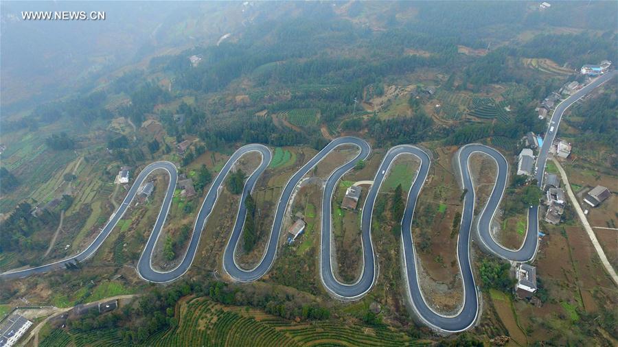 Winding road looks like jade belt around mountain in Central China