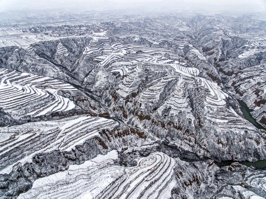 Scenery of snow-covered terrace fields in N China