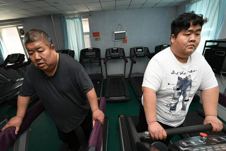 Father and son unite in war against weight