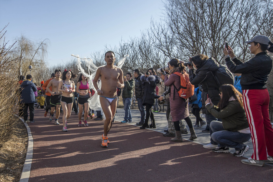 Reporter steals the show at Beijing Naked Run