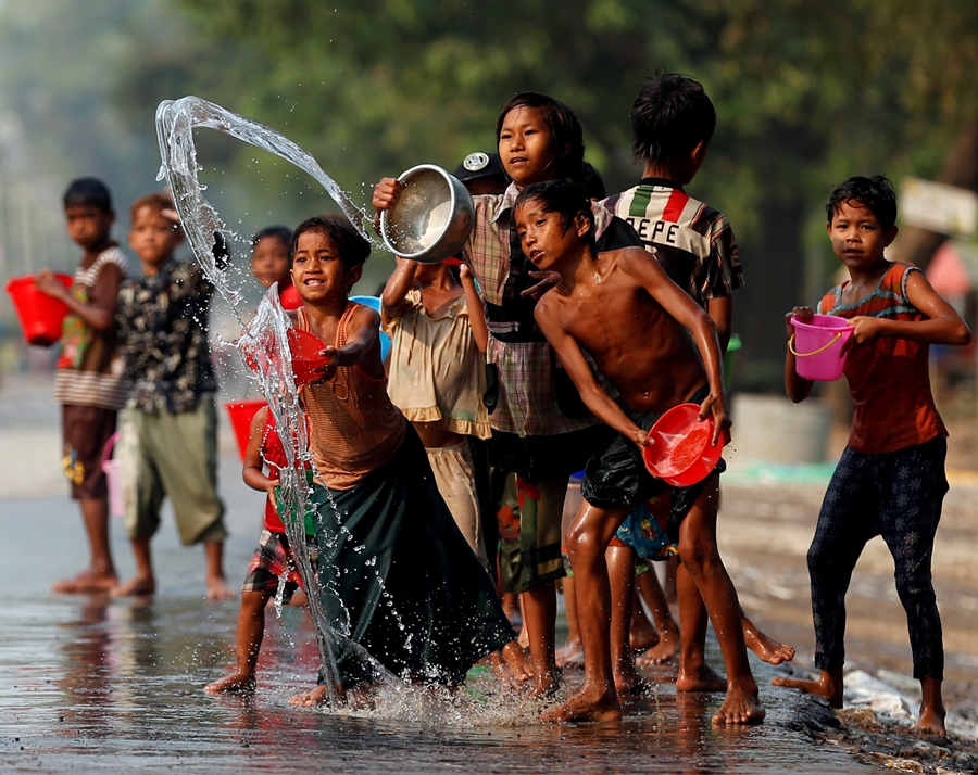 Celebrants mark festival by making a splash