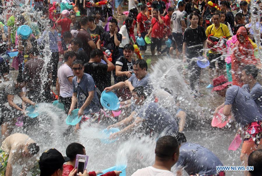 Water-sprinkling festival marked in SW China