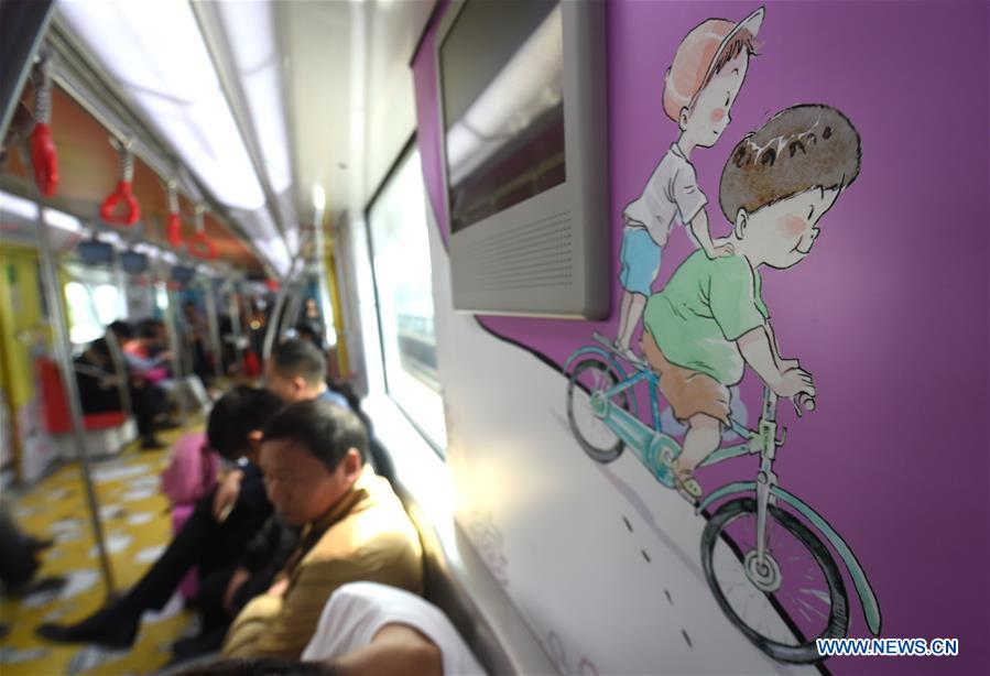 Animation-decorated metro trains ease commuting pressure